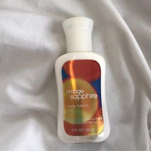 Orange sapphire travel size body lotion
